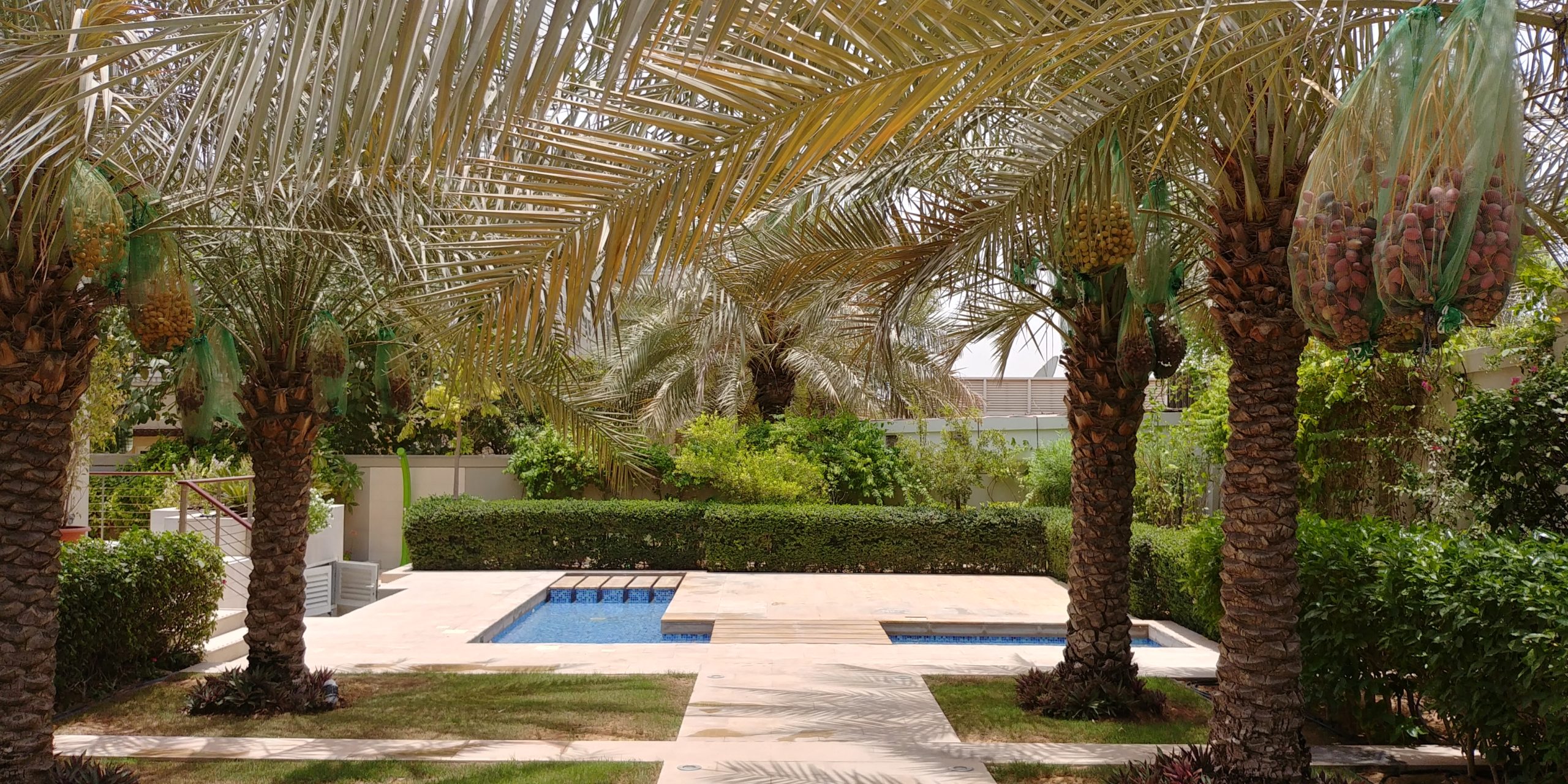 Terraced landscaping with water features at the Samina Ahmed Villa in Emirates Hills by RTAE